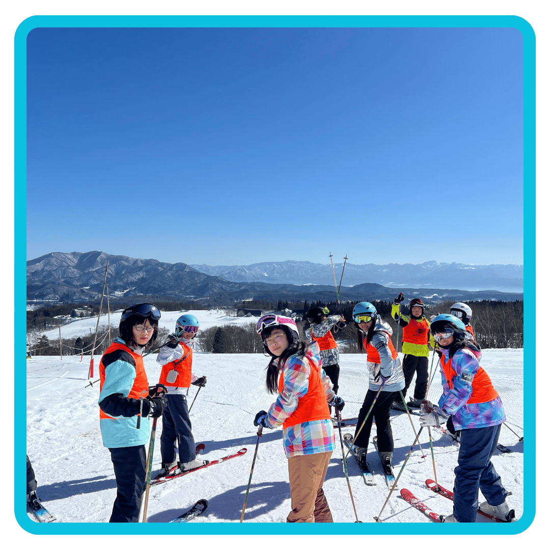 Children learning to ski during a family ski adventure in Japan