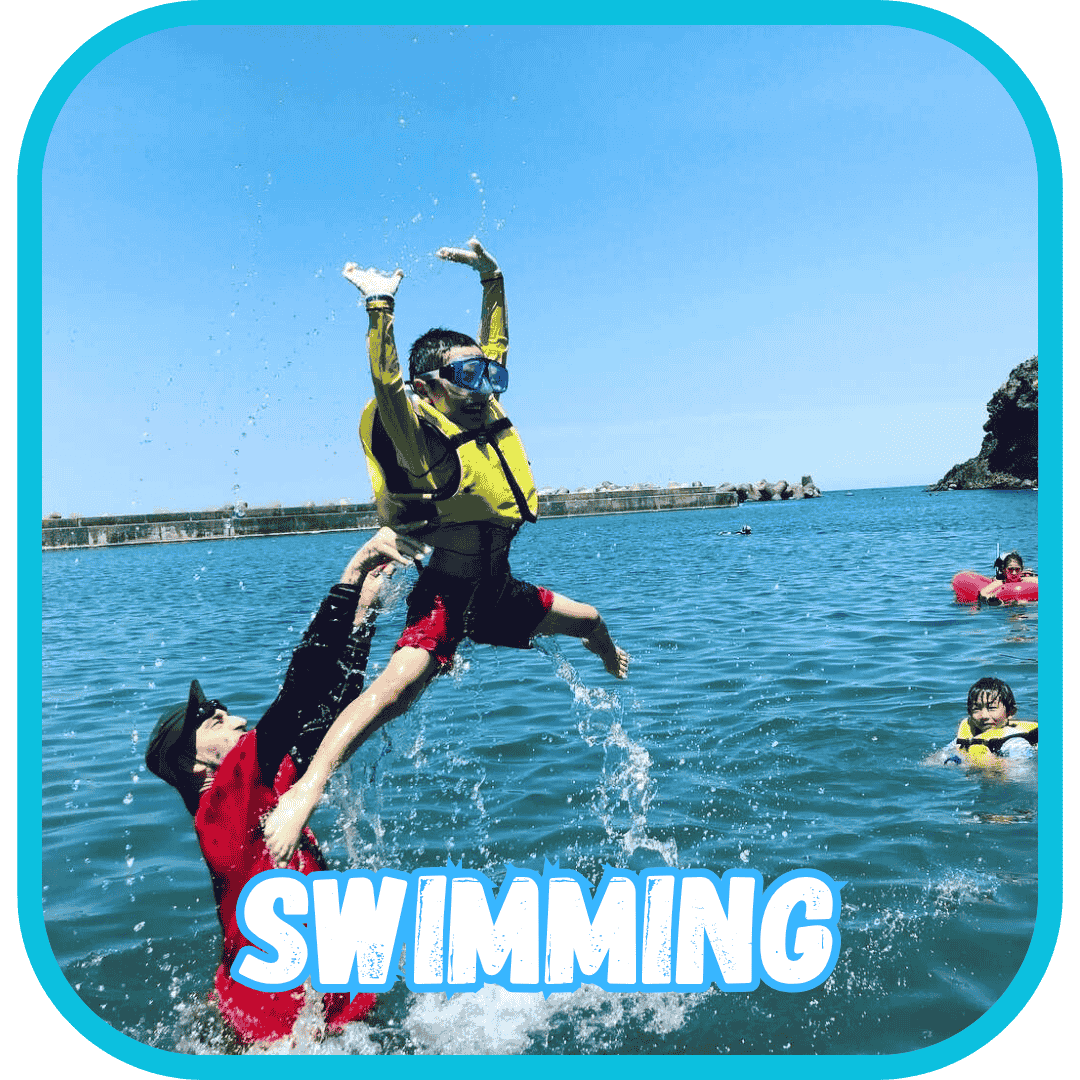 swimming in the beautiful ocean of Okinawa at Summer Camp