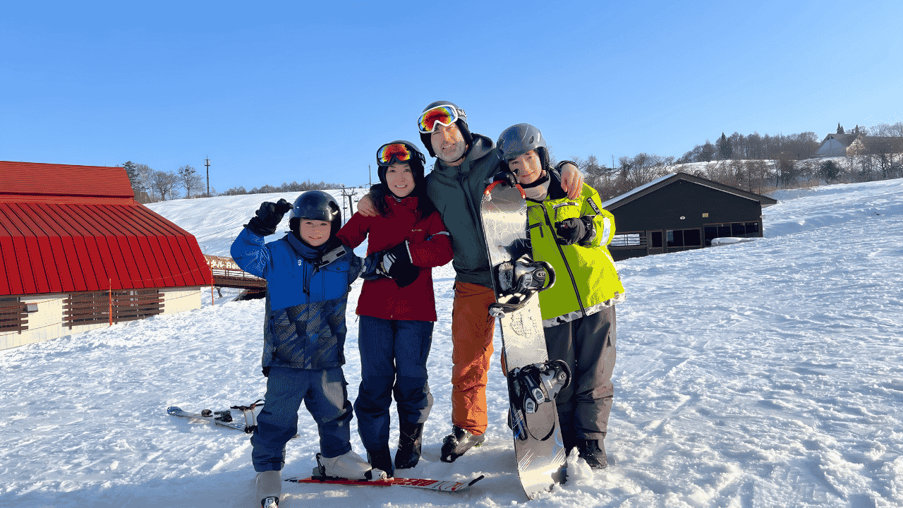 Families enjoying skiing together in the mountains of Nagano