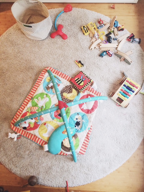 Baby and Toy explosion in our living room