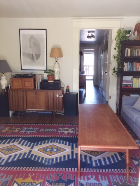 The view from the living room to the hallway to their bedroom