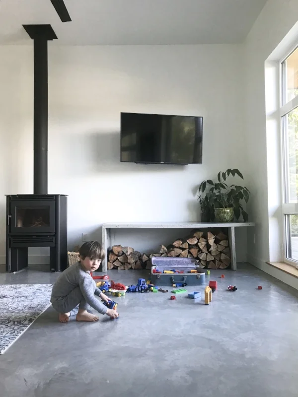The magical suitcase of duplo. Theo in his Simply Merino PJ's.