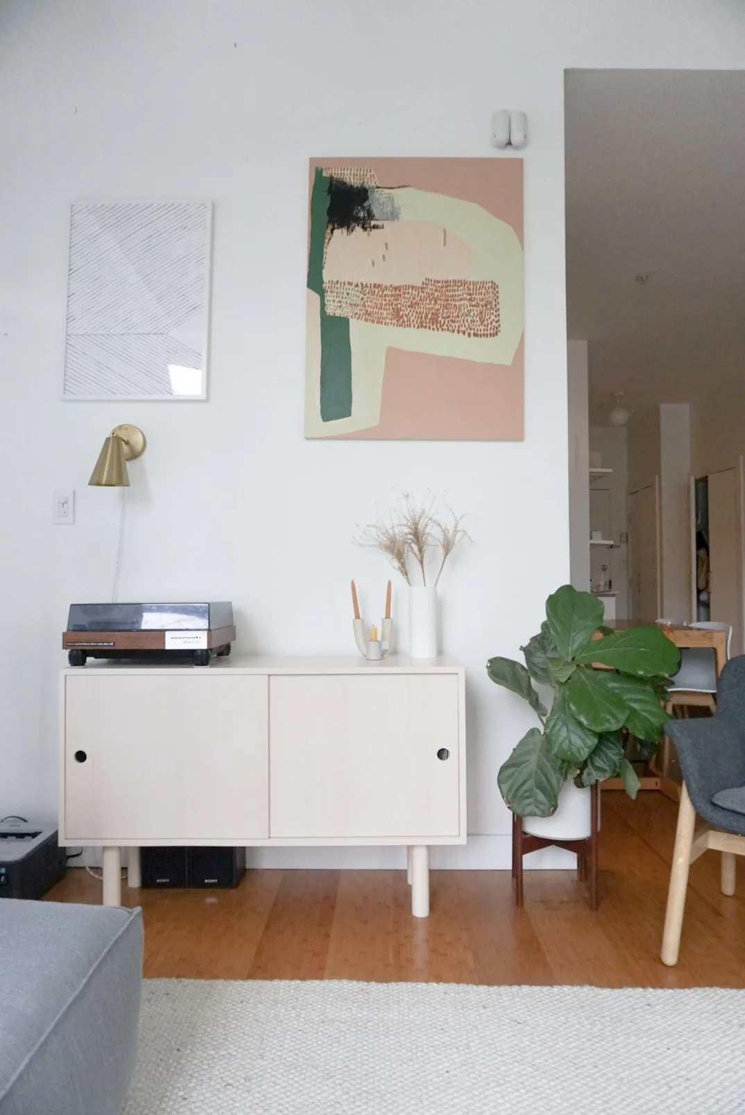 Another angle of our printer in the living room. This wall is a work in progress and I have been playing around with art layouts. (note: speakers under the cabinet while ugly bring us much happiness as they play the music from our record player. I’d love to find a solution to hide them while still getting clear sound, or alternatively replace with a prettier speaker…. one day).