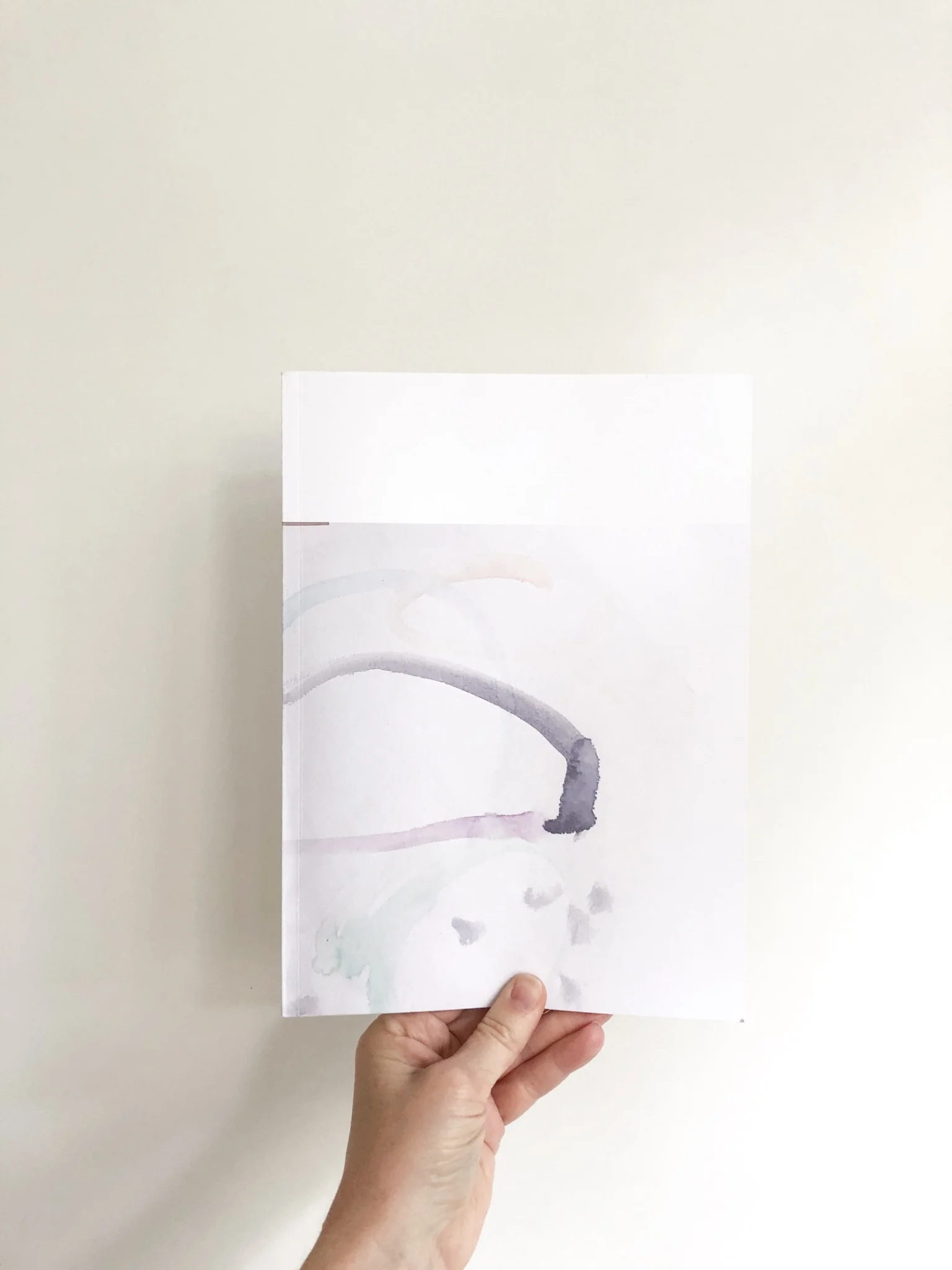Kid Art in a Small Space - Mae’s watercolour painting on the cover of the Recently Magazine I made of their art