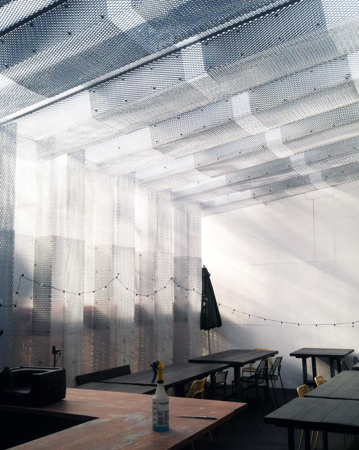 Construction the structure is wrapped in a corrugated polycarbonate skin for weather protection.