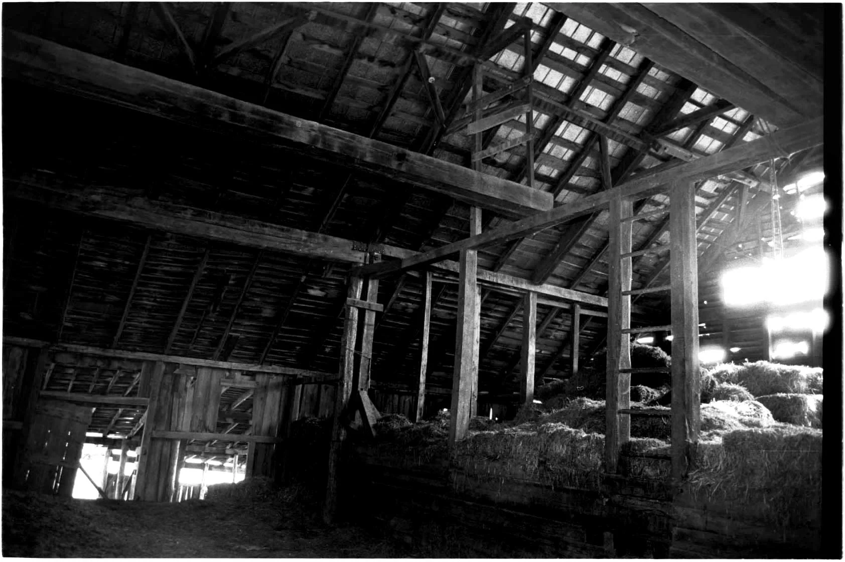 The Artifact the large wooden door moans as it opens, immediately the senses are engulfed by the heavy sweetness of aged hay. the presence of the massive timber slowly reveals its magnificence as the eyes adjust to the soft interior light. the paper thin walls glow with a marvelous intensity, a composition of light and shadow sculpted by nature and time.