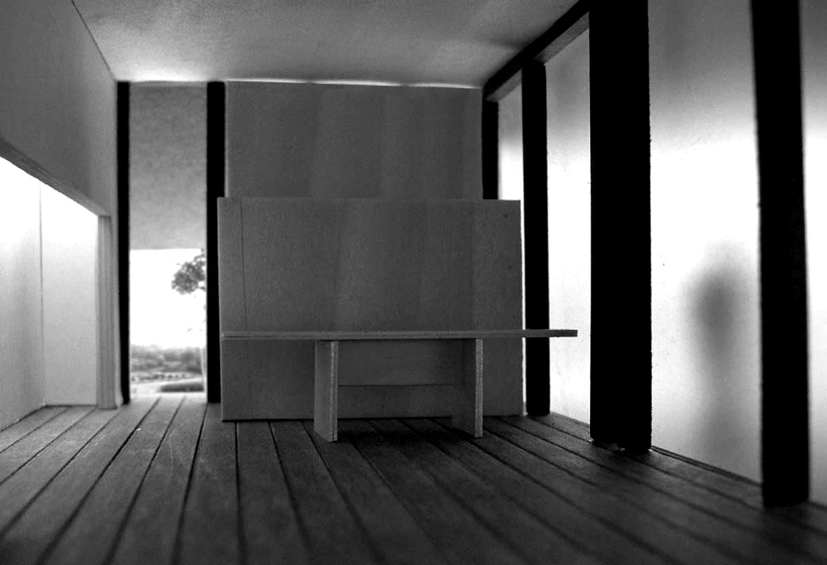Essence the ghostly image of a guest filters through etched glass