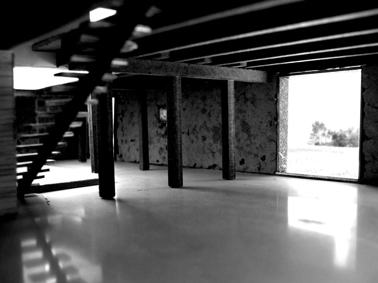 Landscape a large steel box opens to the landscape beyond.