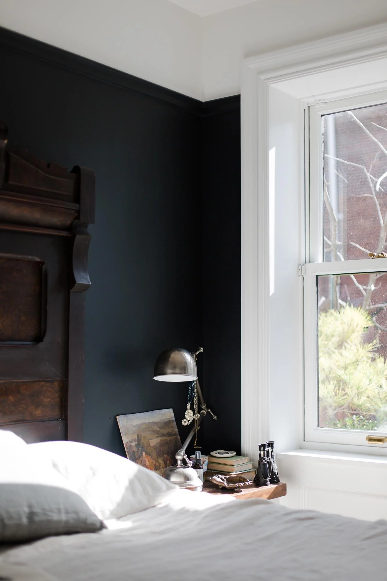   Mood &nbsp; &nbsp;dark walls and rich wood add to the atmosphere of the master bedroom 