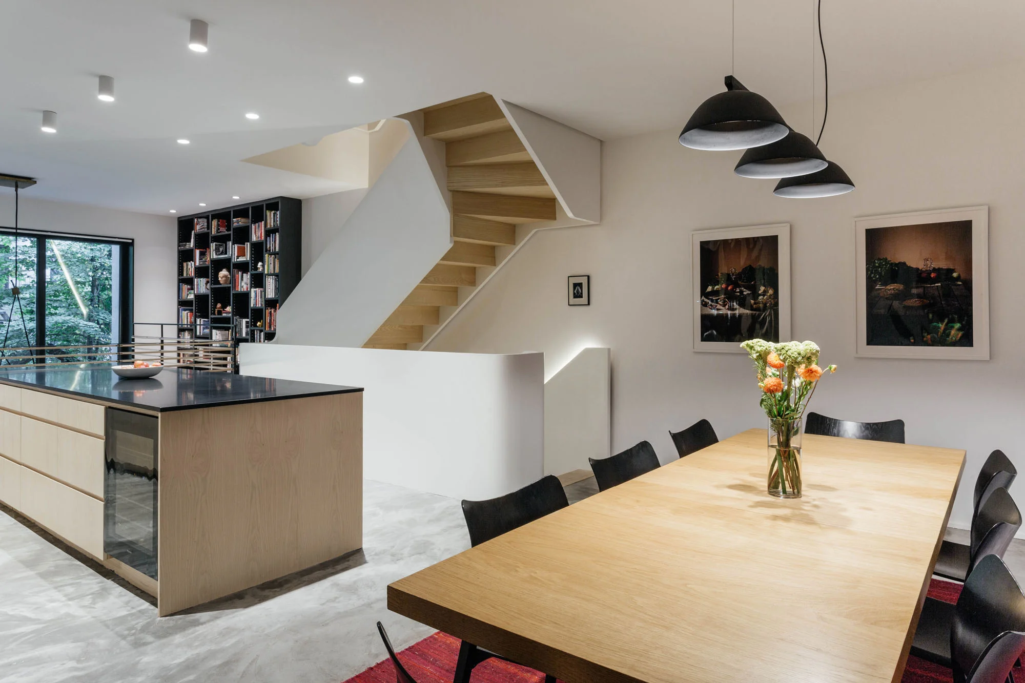 Dining View the ribbon stair has a strong sculptural presence