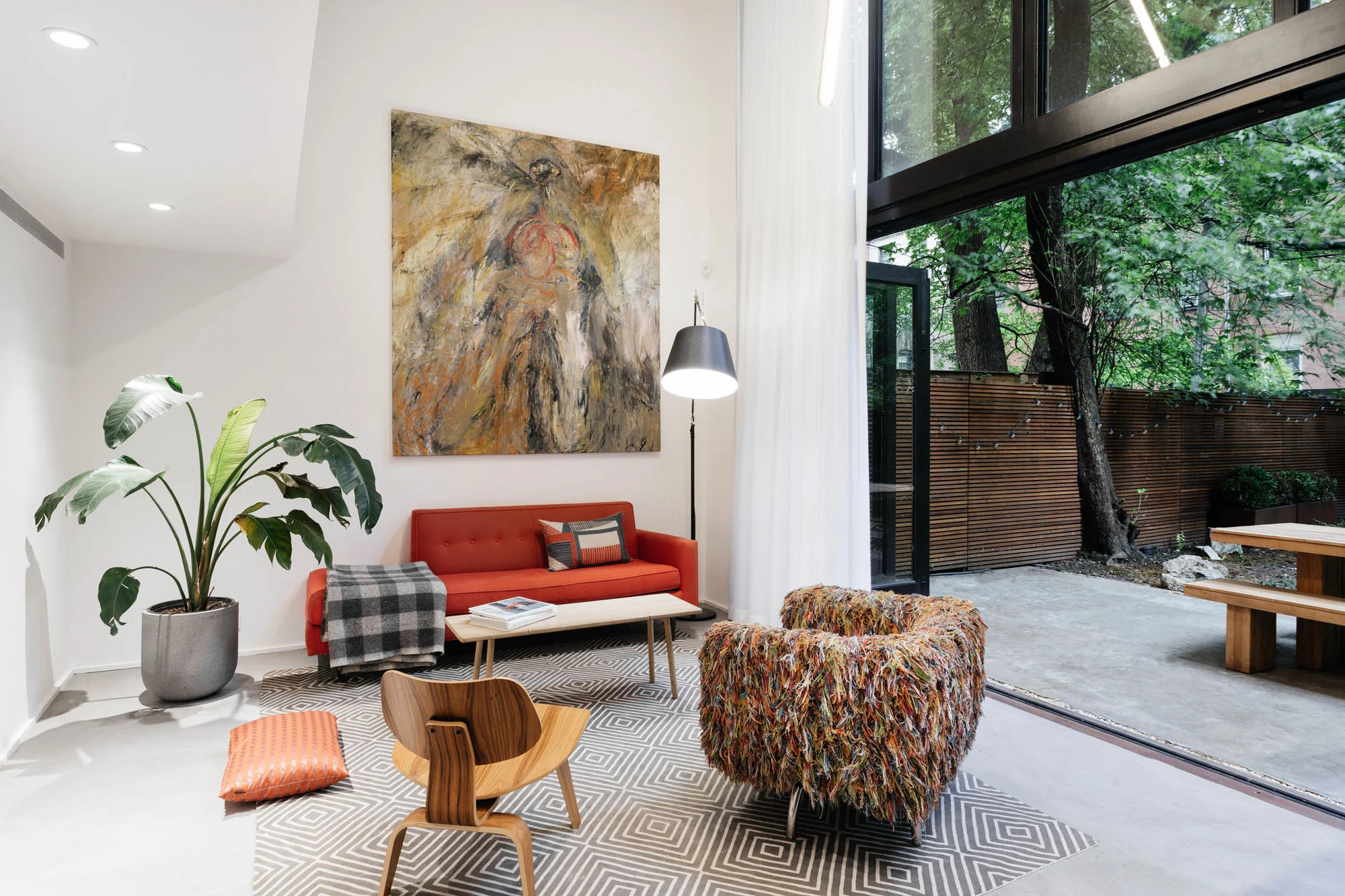   Living   the double height opening at the living room has a strong connection to the rear garden 