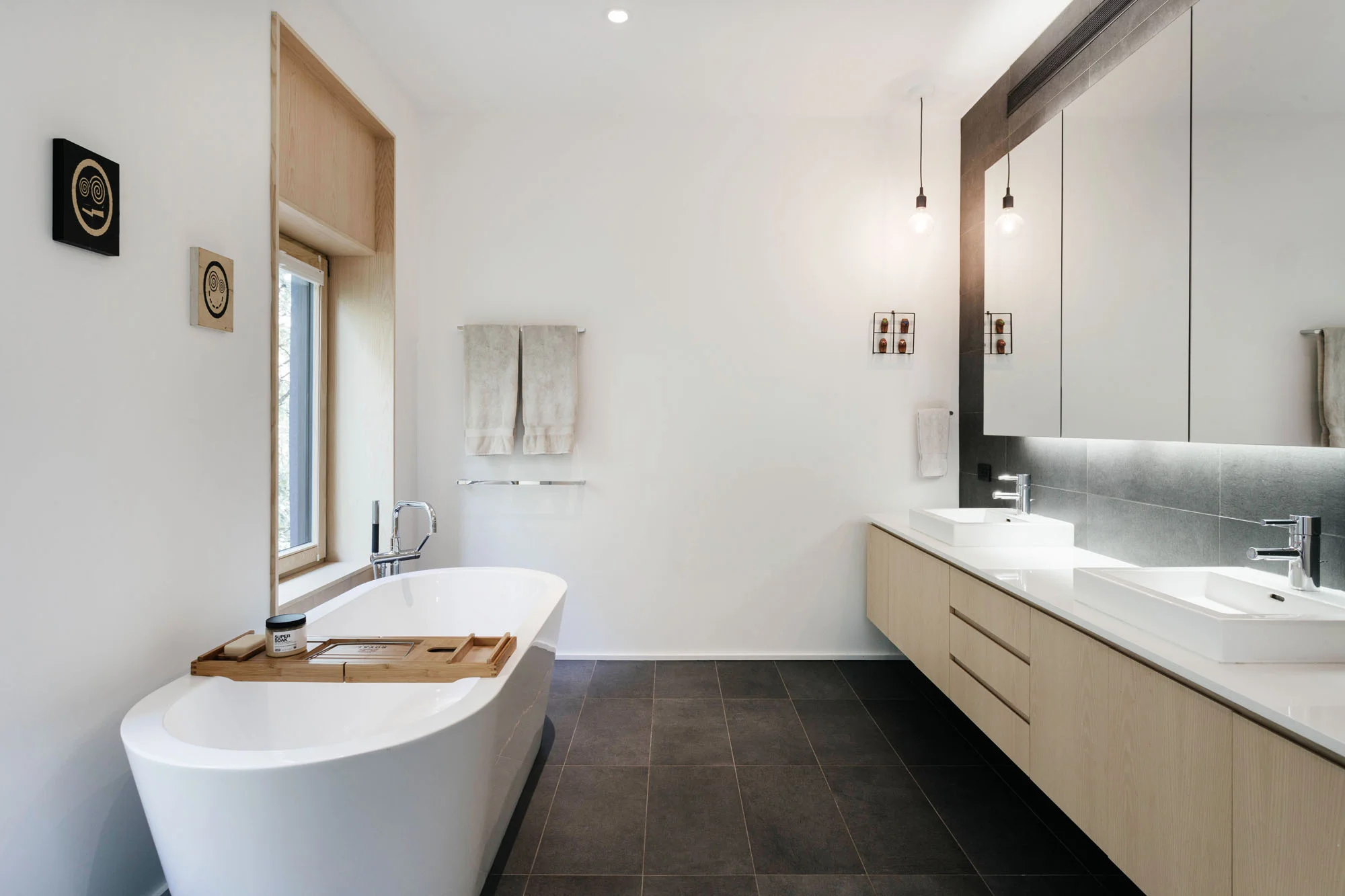 Master Bathroom the simplified palette carried throughout