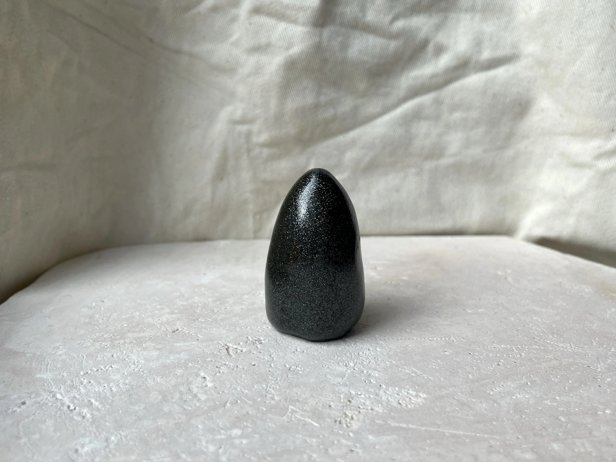 black sparkly handmade figurative ceramic sculpture with glittery glaze