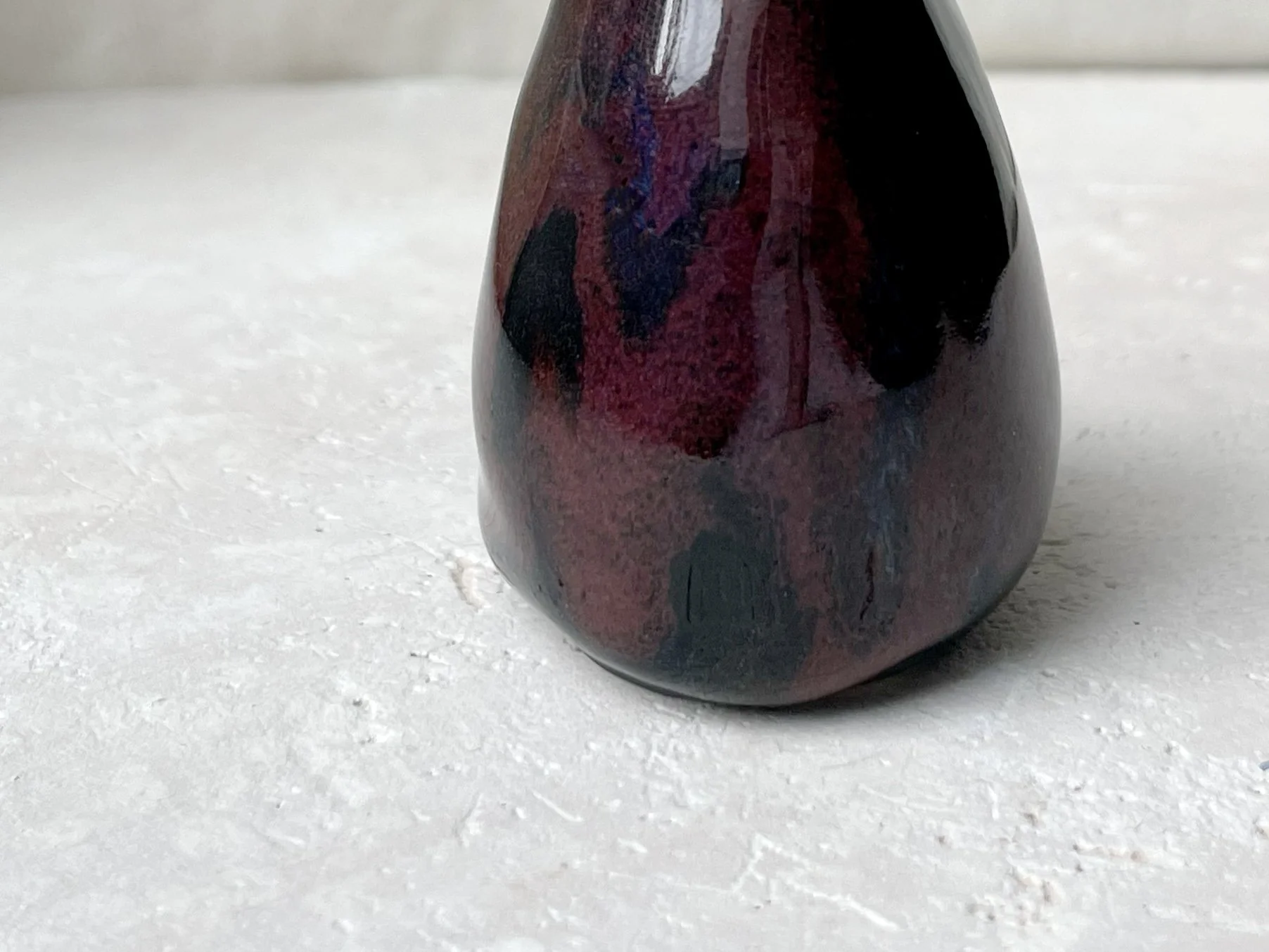 black and red handmade figurative ceramic sculpture with underglaze and floating glaze