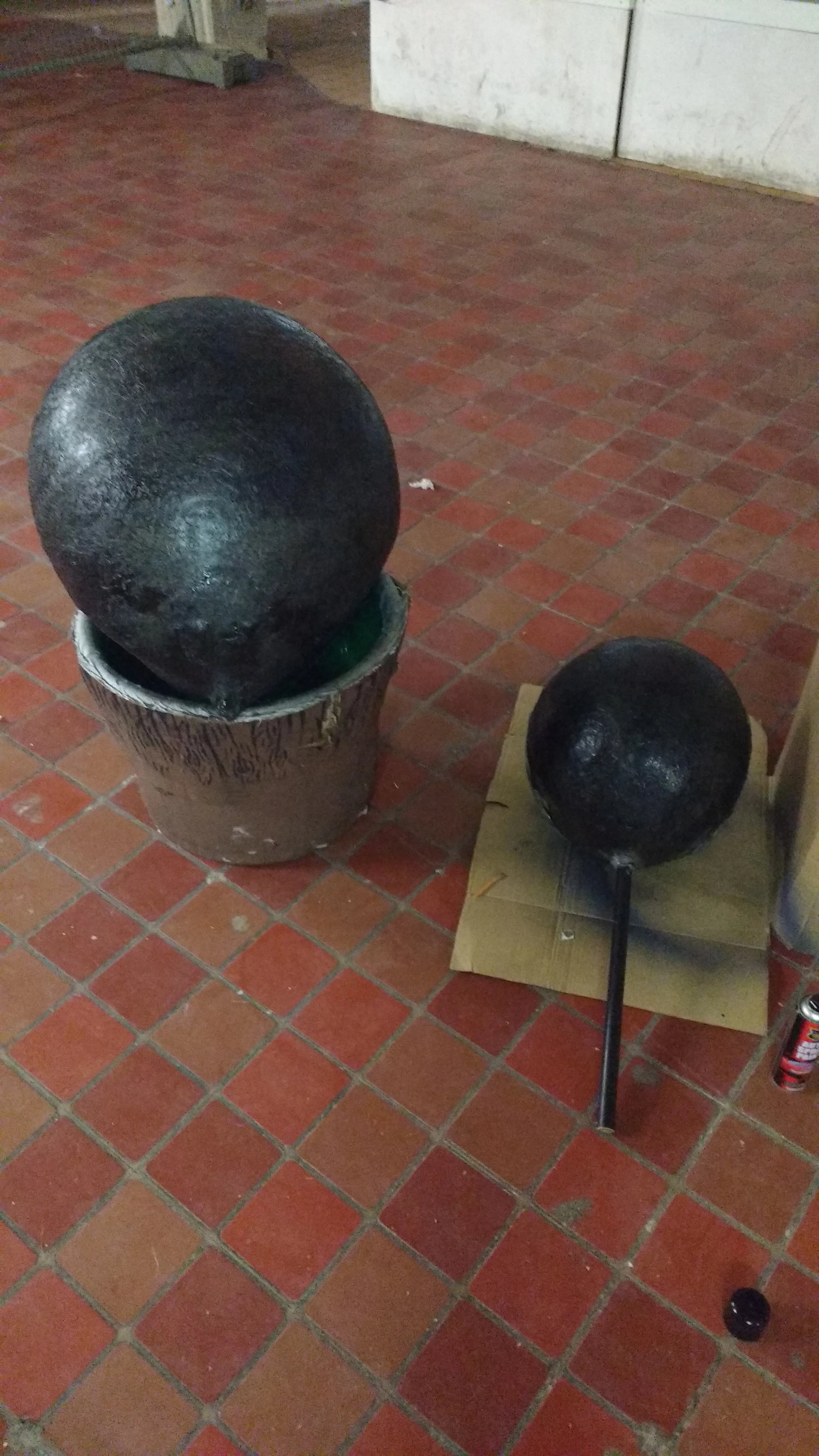 Giant Disco Ball and the disco ball head after being fibre glassed and sprayed.
