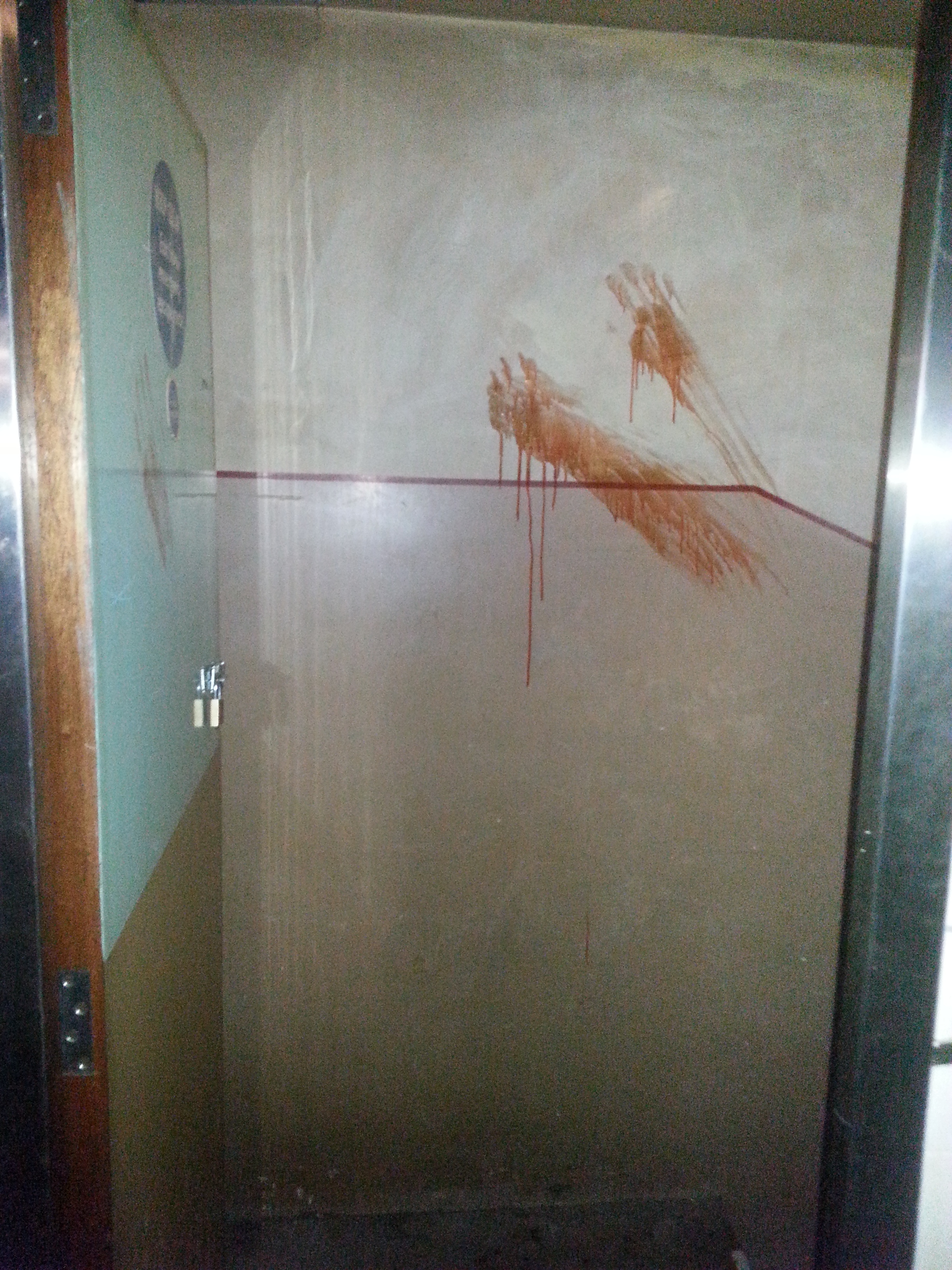 Fake blood hand prints leading down to the basement.  
