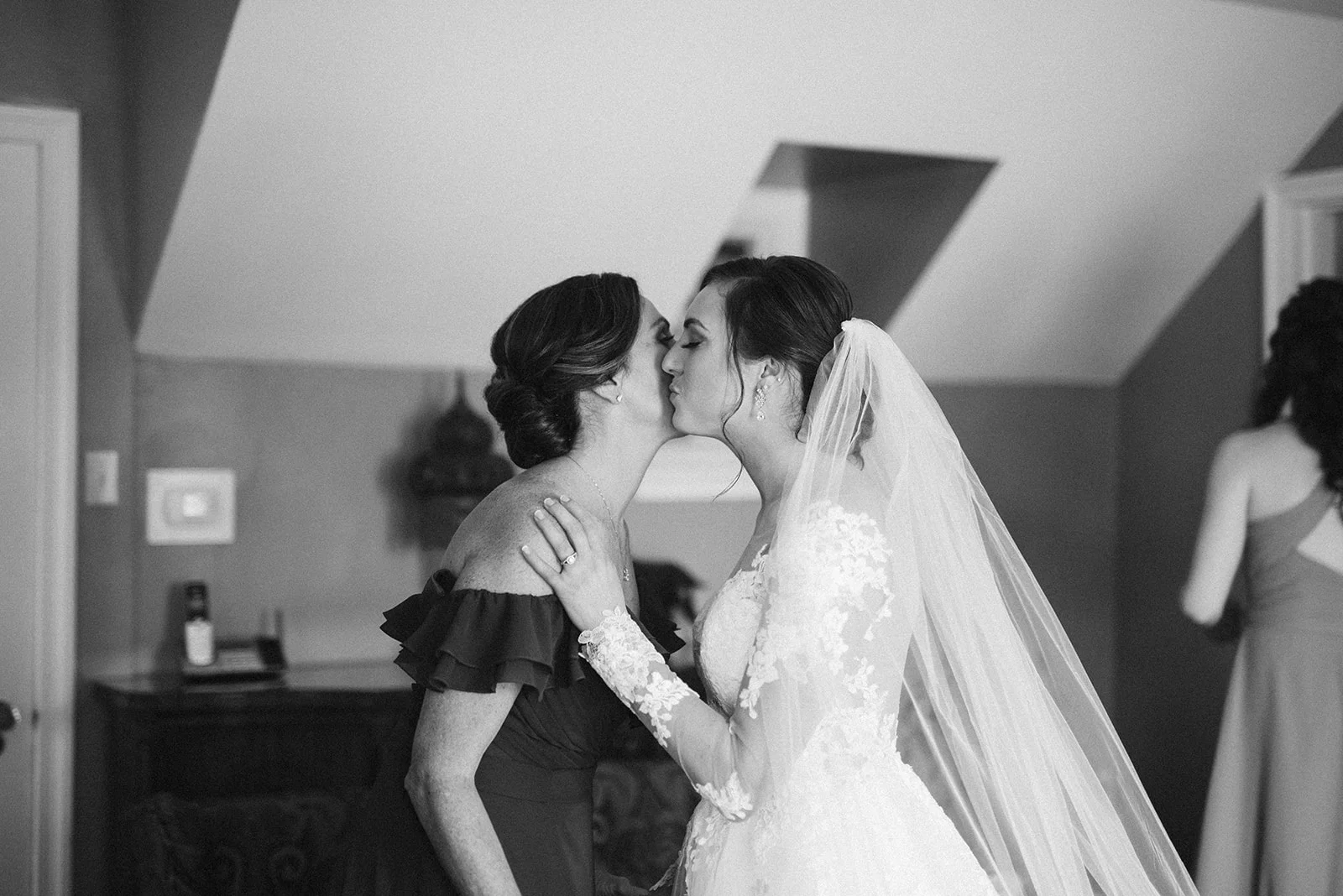 Mother of the bride and bride share a special moment before her ceremony at Drumore Estate.