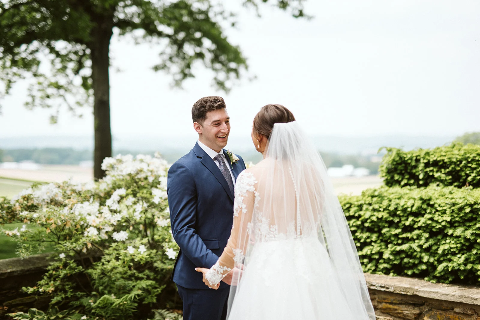 The groom sees his bride for the first time at Drumore Estate.