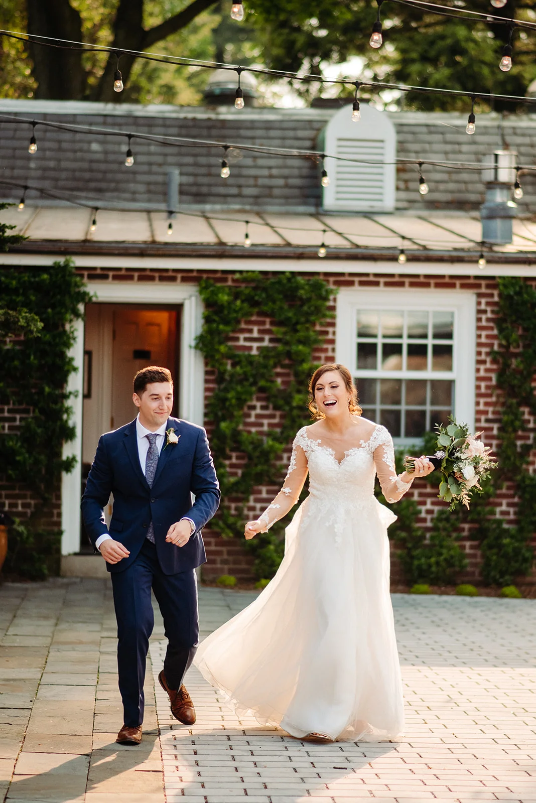 Bride and groom entrance onto the rear patio at Drumore Estate.