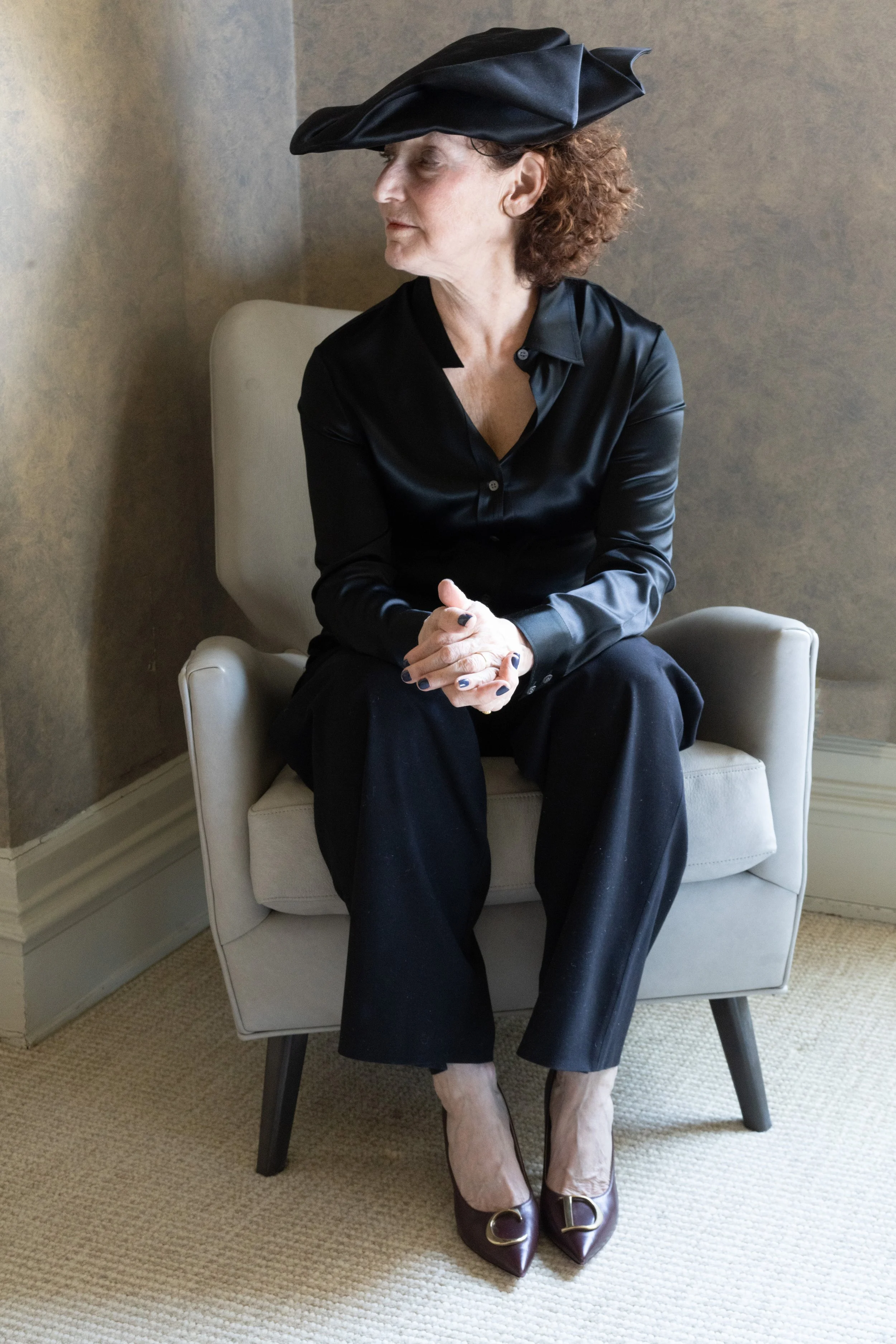   Hat and pumps by Dior, shirt and trousers talent’s own.  