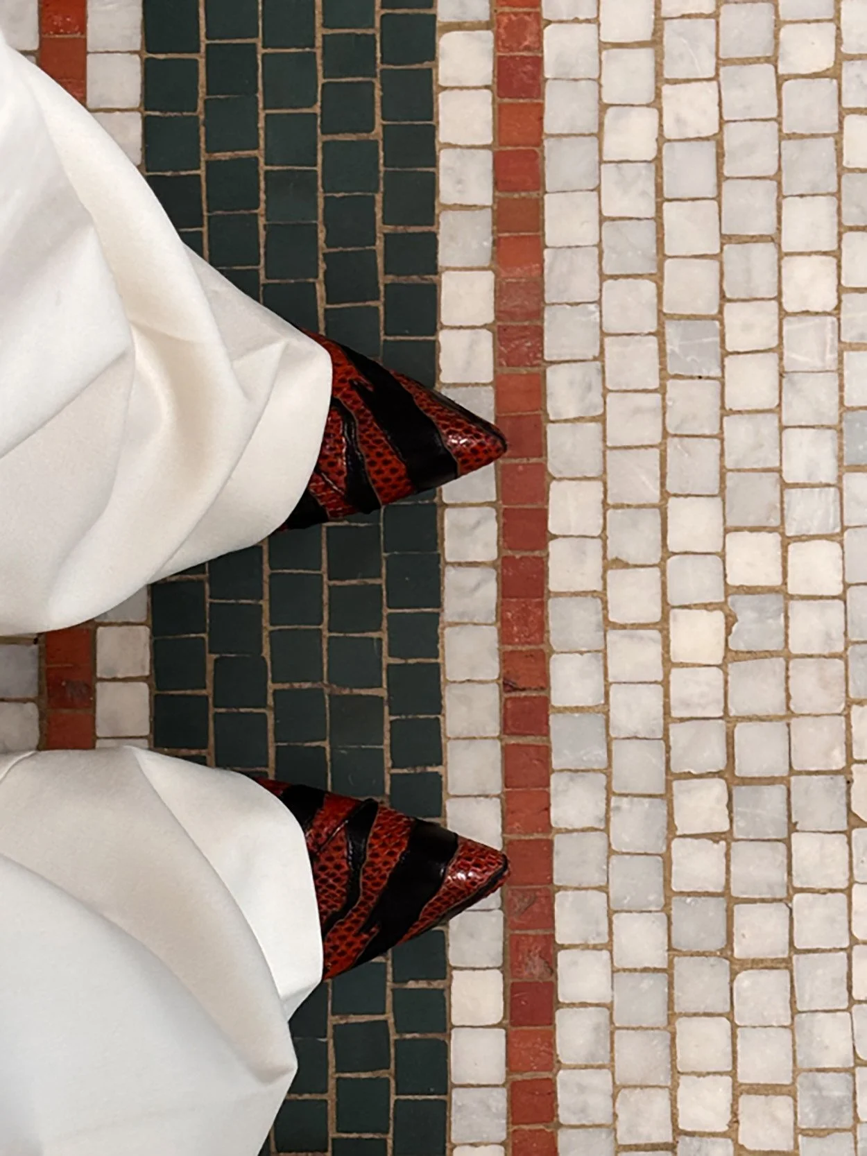   Trousers by Givenchy by Sarah Burton and pumps by Versace.  