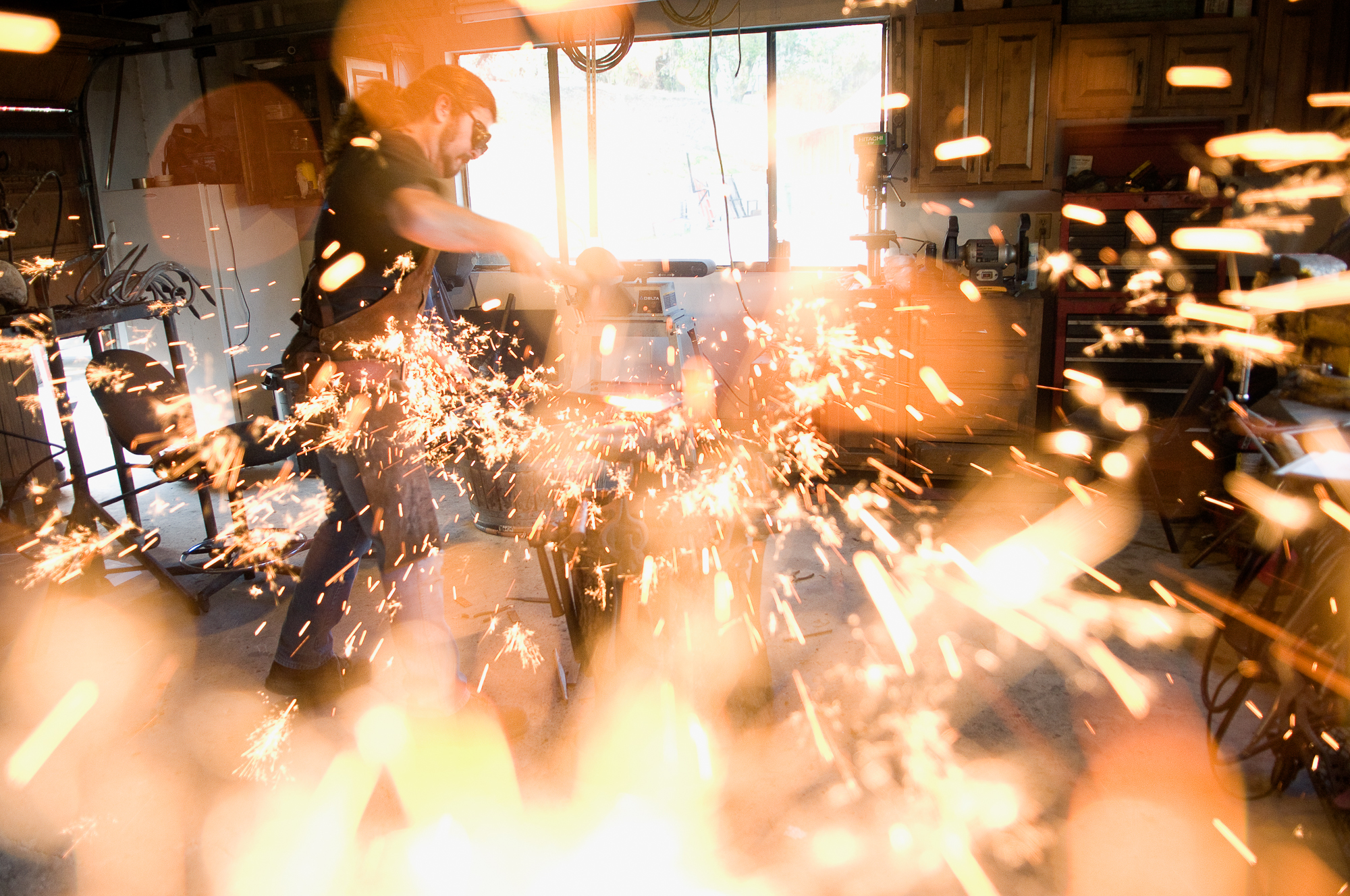 California blacksmith Max Randolph, at his home garage he’s converted into a fully functional blacksmith shop, Nov 29, 2011. 