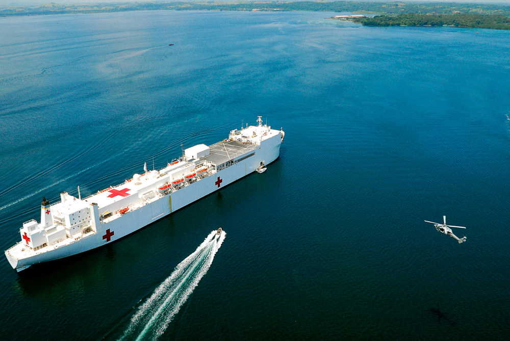 After completing a flight in support of Pacific Partnership 2008, an MH-60S Seahawk helicopter from Helicopter Combat Squadron (HSC) 21, the “Blackjacks,” returns to USNS Mercy (T-AH 19) anchored off the coast of Cotabato, Republic of the Philippines May 30, 2008. Pacific Partnership is a four-month humanitarian mission to Southeast Asia intended to build collaborative relationships by providing engineering, civic, medical and dental assistance to the region. 