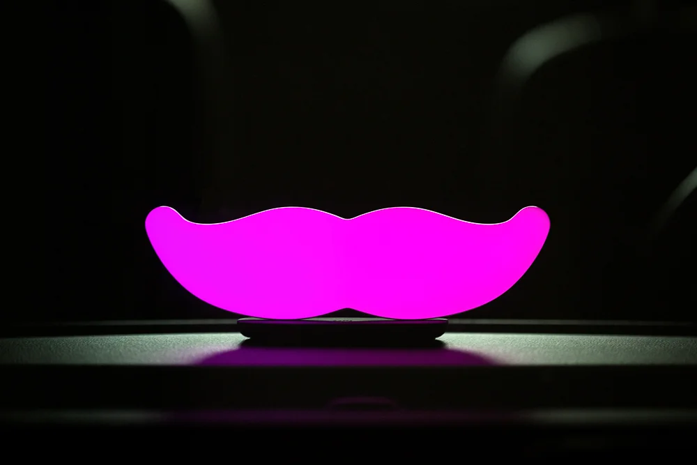  The new  "glowstache"  is version 2.0 of Lyft's iconic pink mustache. 