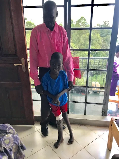  Jek & his father celebrate his first steps