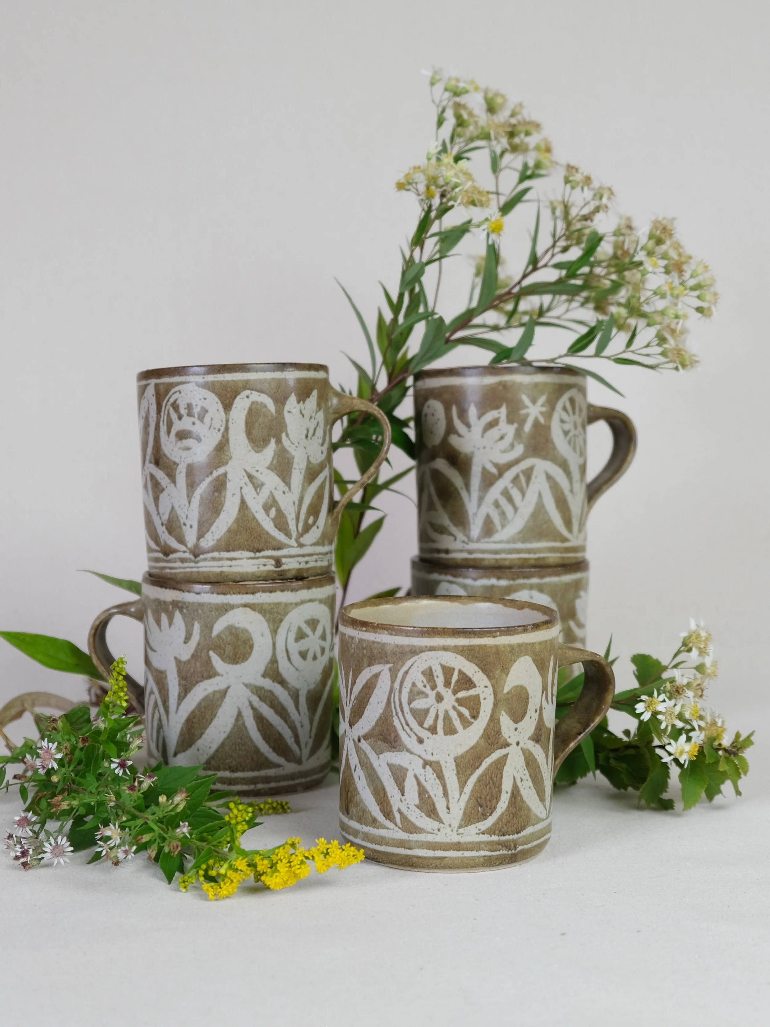 Mugs ~~

Glaze and wax resist on red stoneware