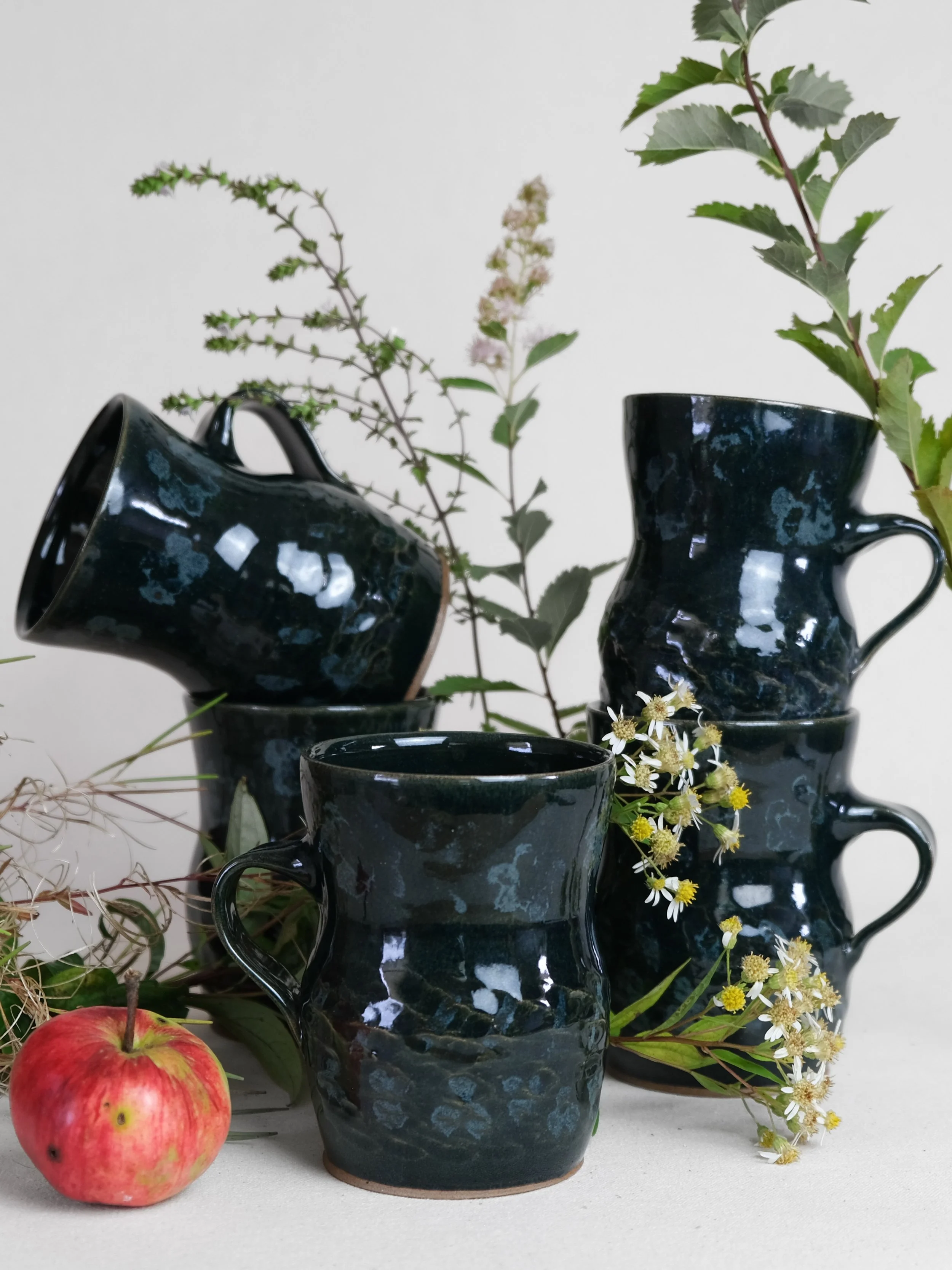 Night flower mugs ~~

Glazed red stoneware