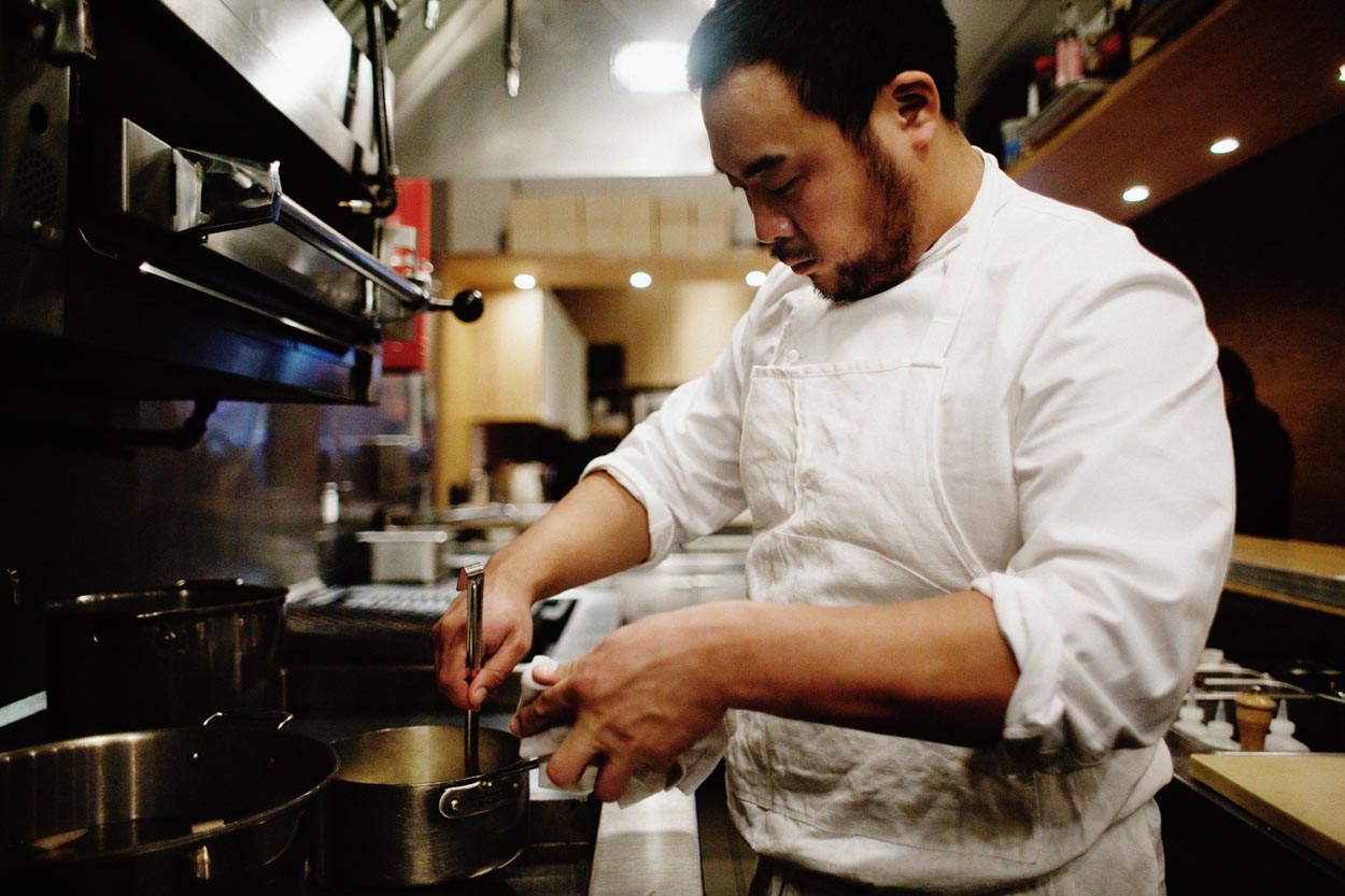 David Chang in the kitchen. From Momofuku .