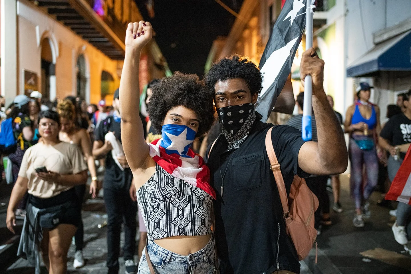 Demonstrators celebrate the resignation of Governor Ricardo Rosselló on Calle de la Fortaleza. After nearly two full weeks of sustained protests against the Governor of Puerto Rico and the corruption that had defined his government, especially in th