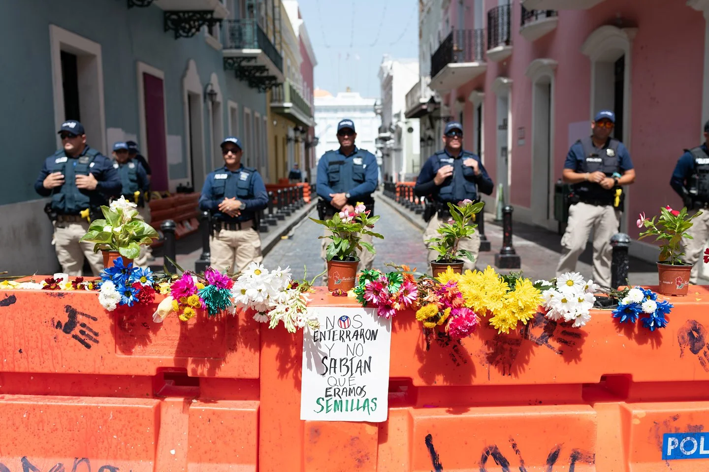  A sign placed outside of the barricades on Calle de la Fortaleza close to the Governor’s mansion which reads: "They buried us and they didn't know we were seeds". Old San Juan, July 24th, 2019. 