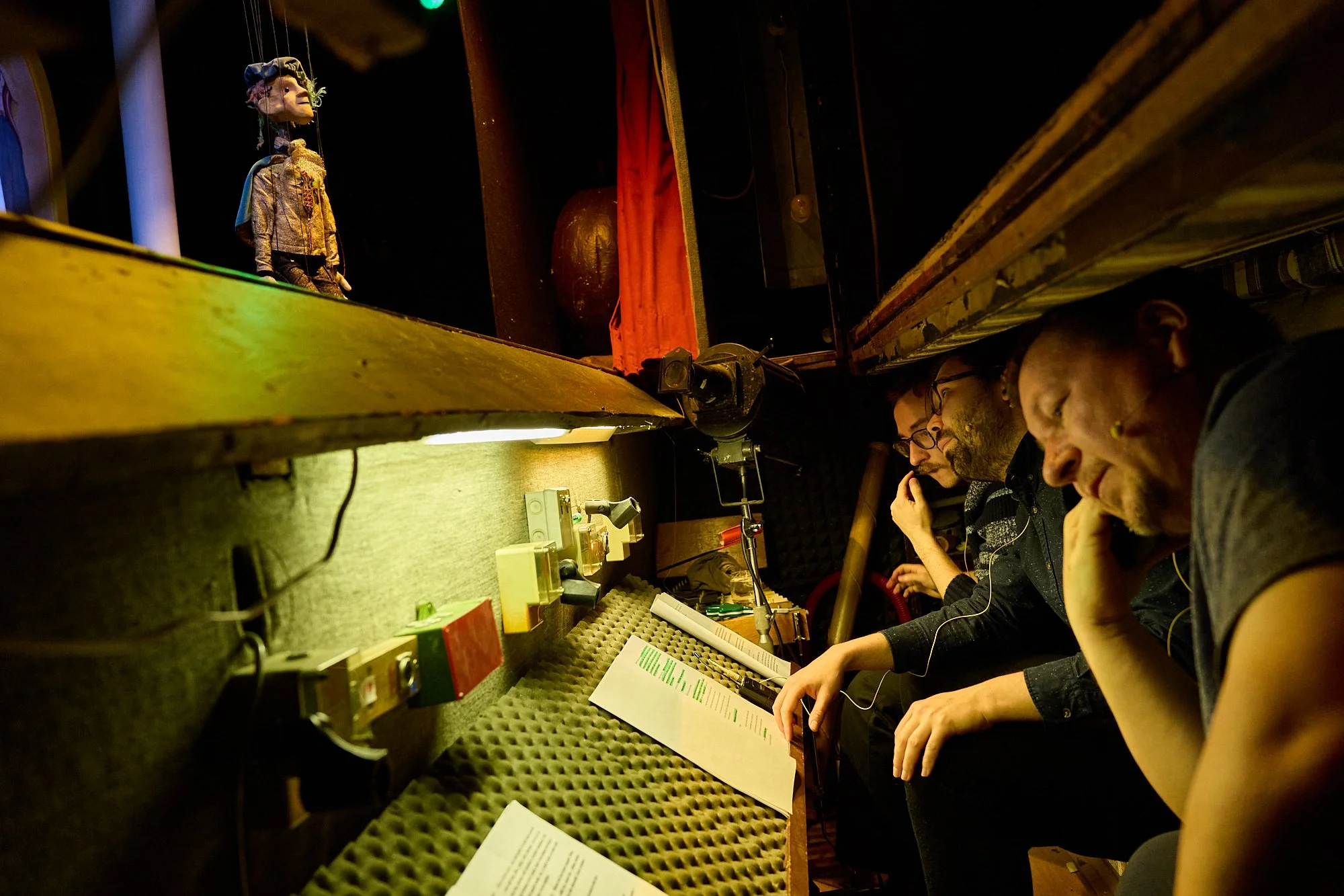  Jiri and others voice characters and managae the performace from beneath the stage.  