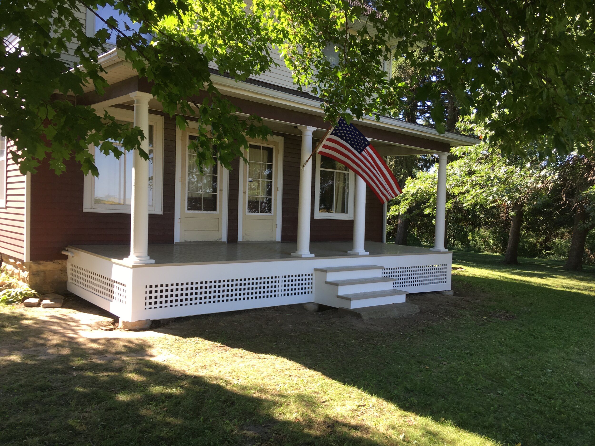 100+-year-old front porch restoration with modern materials. 
