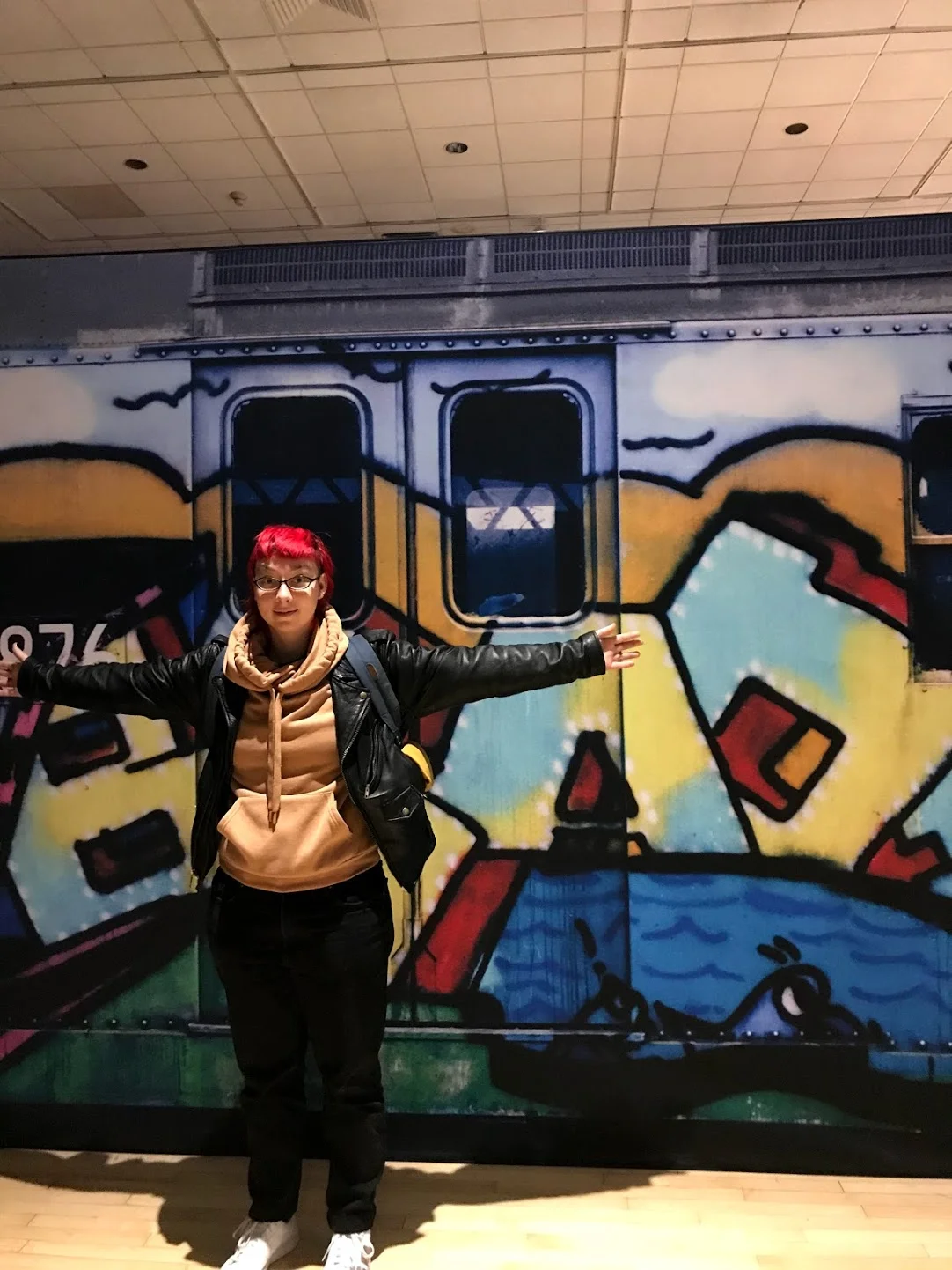 Me, standing in front of a subway-car sized model