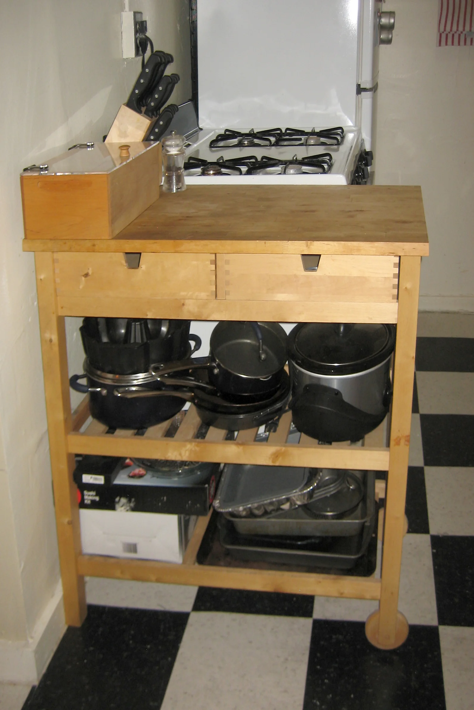  Kitchen Workspace After  The size works much better, and previously inconveniently located pots and pans are now easily accessible. 