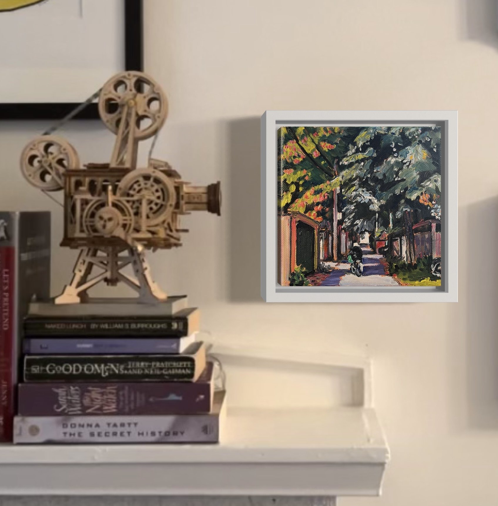 “Urban Commuter” shown in a home office, placed above a desk to showcase how this small-format artwork adds vibrancy to a work or living space.