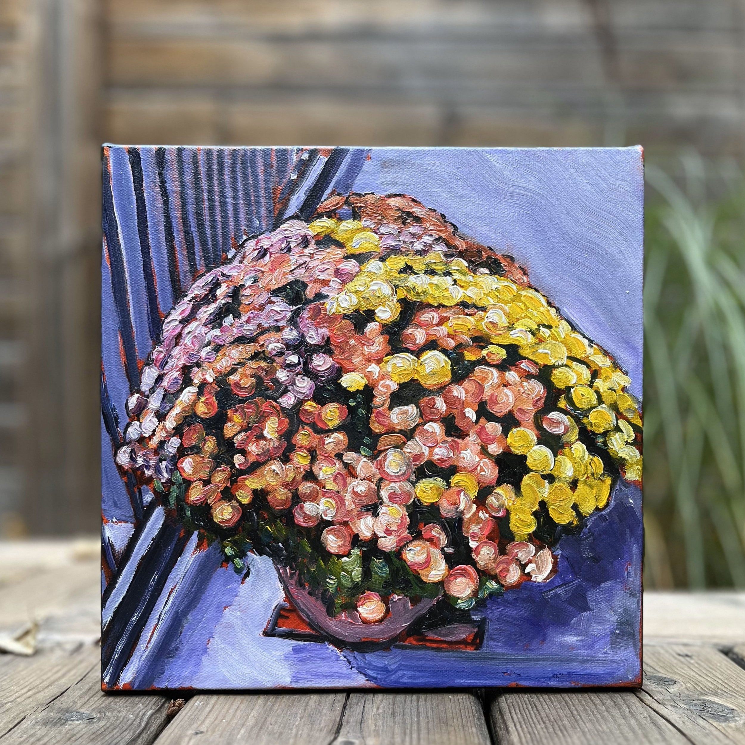 Head-on view of All the Colours, All at Once: a striking bouquet of colors in oil, perfect for adding a lively pop of color to any wall or small space.