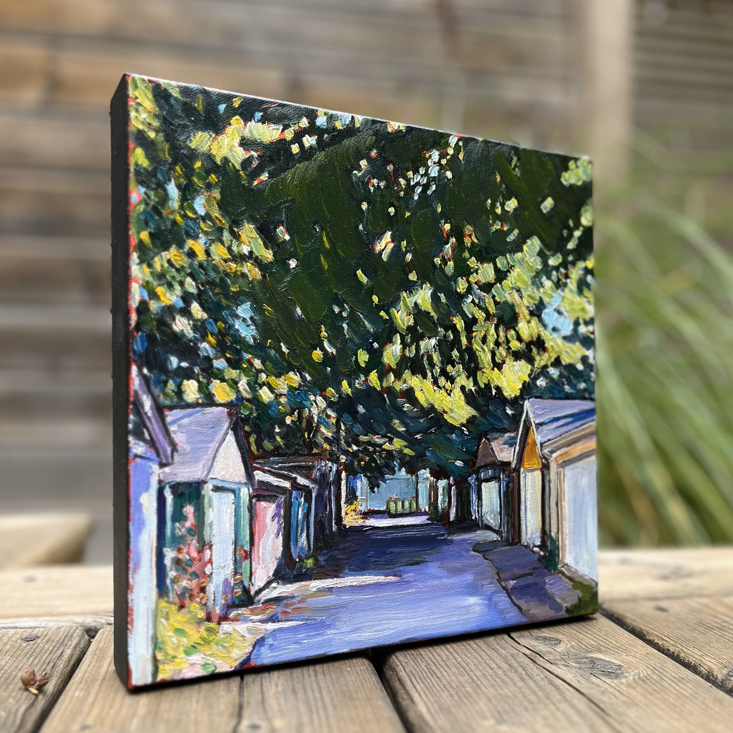 The Space Between - Side angle view showcasing the textured brushstrokes and layered depth of this 10"x10" original oil painting by Leslie Parker.