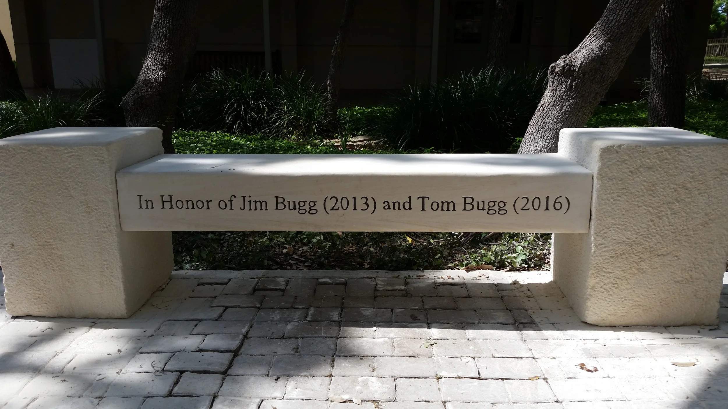 Custom carved limestone bench memorial.