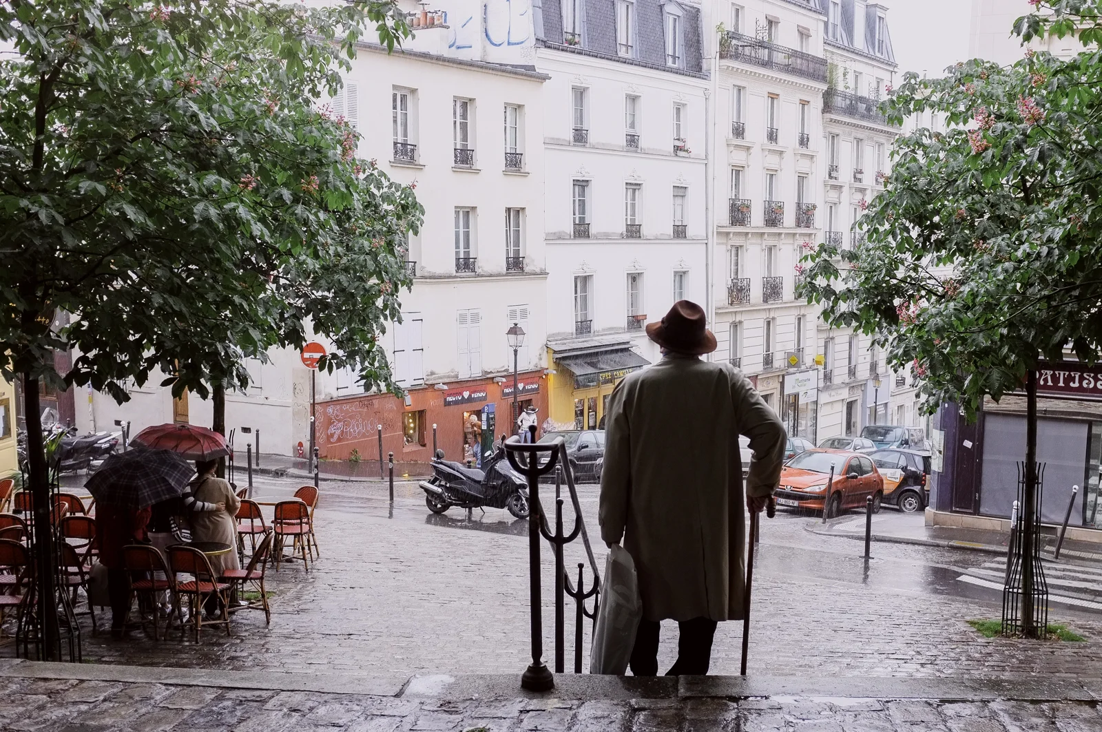 Old man in the rain