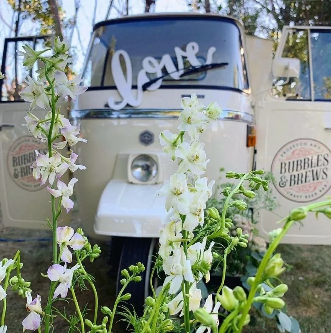 Love is in the air this month! 🥰 Don't forget to celebrate this upcoming Valentine's with your special someone! 🥂💖 @bubblesandbrewsnd
.
#bubblesandbrews #getcozyvintagemobilebars
#mobilebar #vendorlist #getcozy #piaggio #drinks
#brideandgroom #e