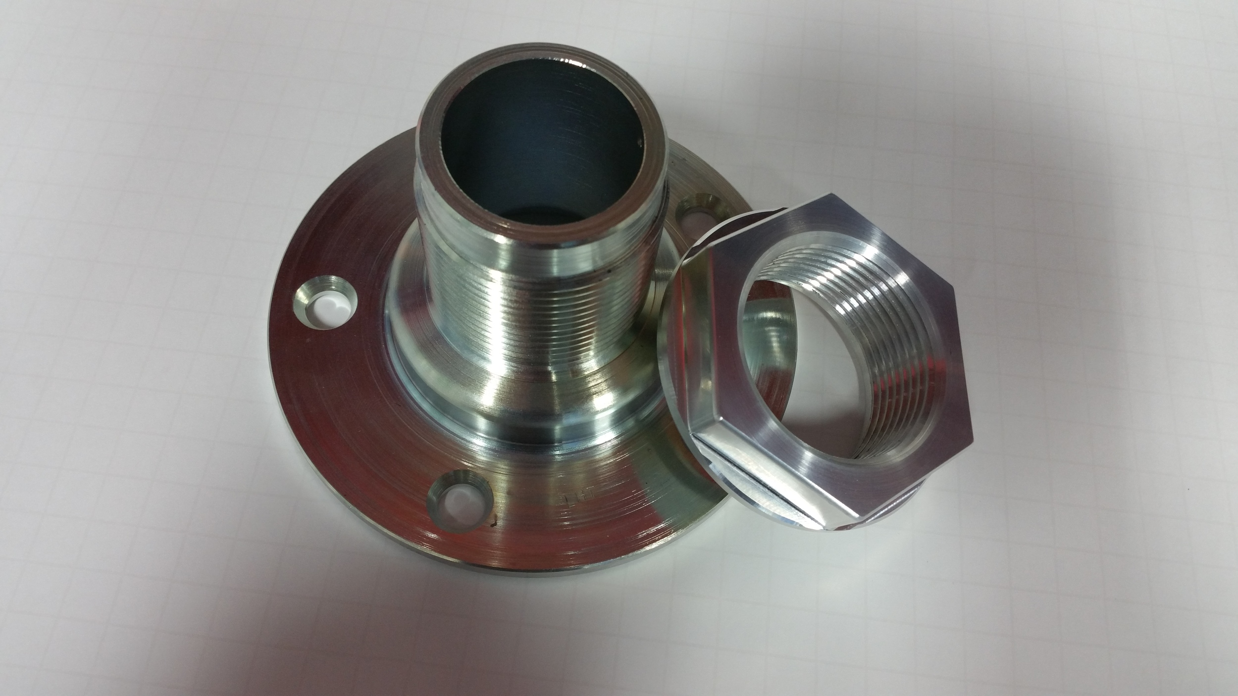 Adapter and nut custom machined for the Superlite SL-C centerlock wheel option