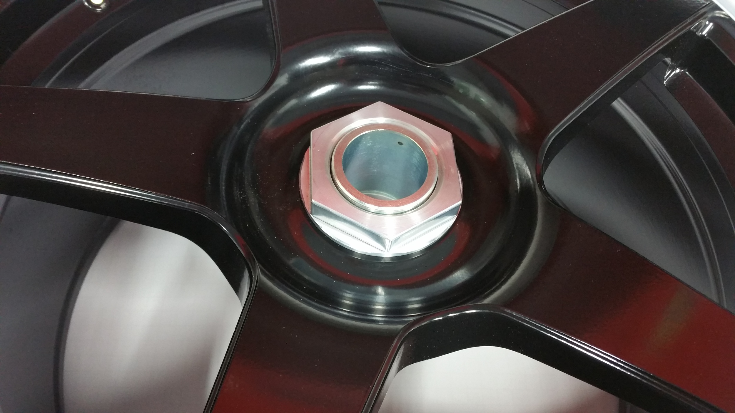 Closeup of a Forgestar CF5 wheel converted to centerlock.