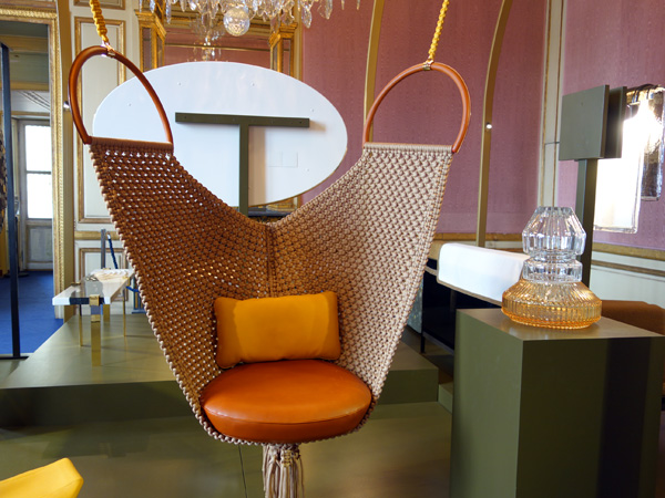 From the Louis Vuitton Objet Nomades collection, Swing Chair by Patricia Urquiola. Vase by Baccarat