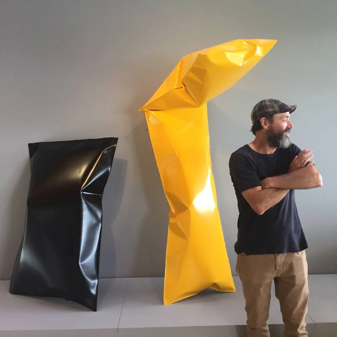 Braddon Snape with his sculptures at Lake Macquarie City Art Gallery during 2017