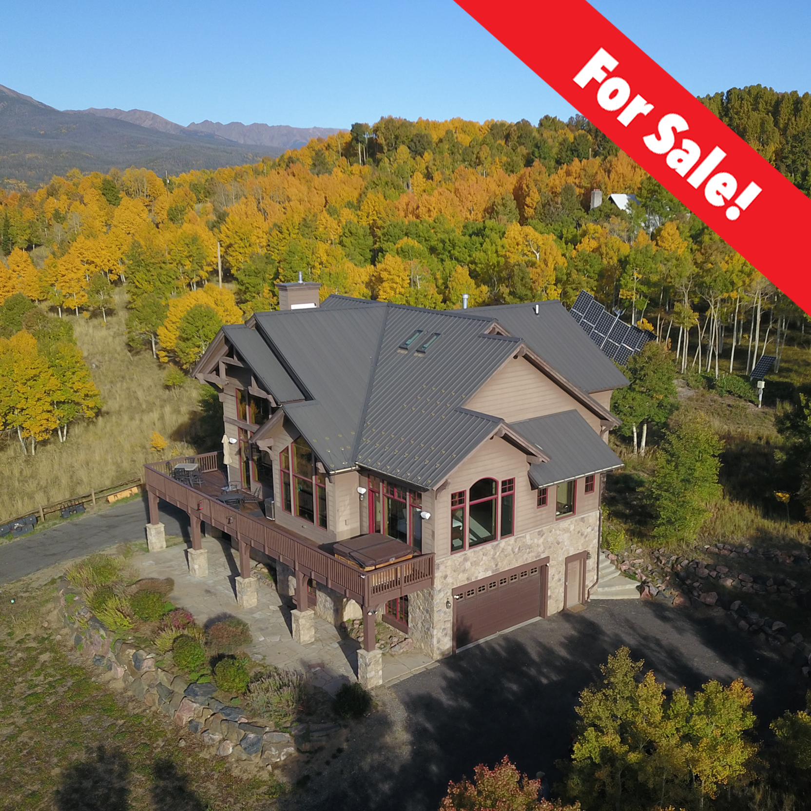  Welcome to the Top of the World! An iconic Silverthorne residence offering jaw-dropping panoramic views of Lake Dillon, the Ten Mile Range and the Gore Range. Situated on over two acres and adjacent to the Ptarmigan Trail, the unique natural setting