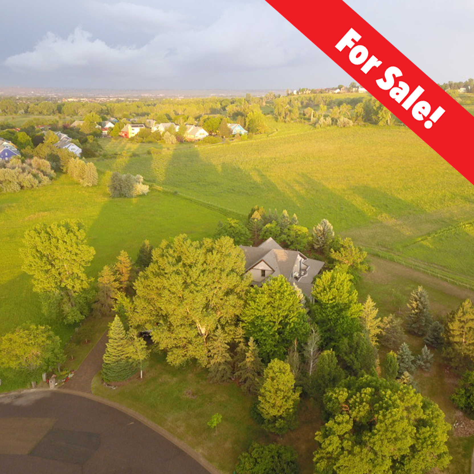 An exceptionally rare offering at The Farm on Brittany Lane in Lafayette, Colorado. Nestled in an exclusive enclave of just five custom homes, this timeless custom Craftsman-style residence exudes warmth, character, and a deep reverence for nature.
